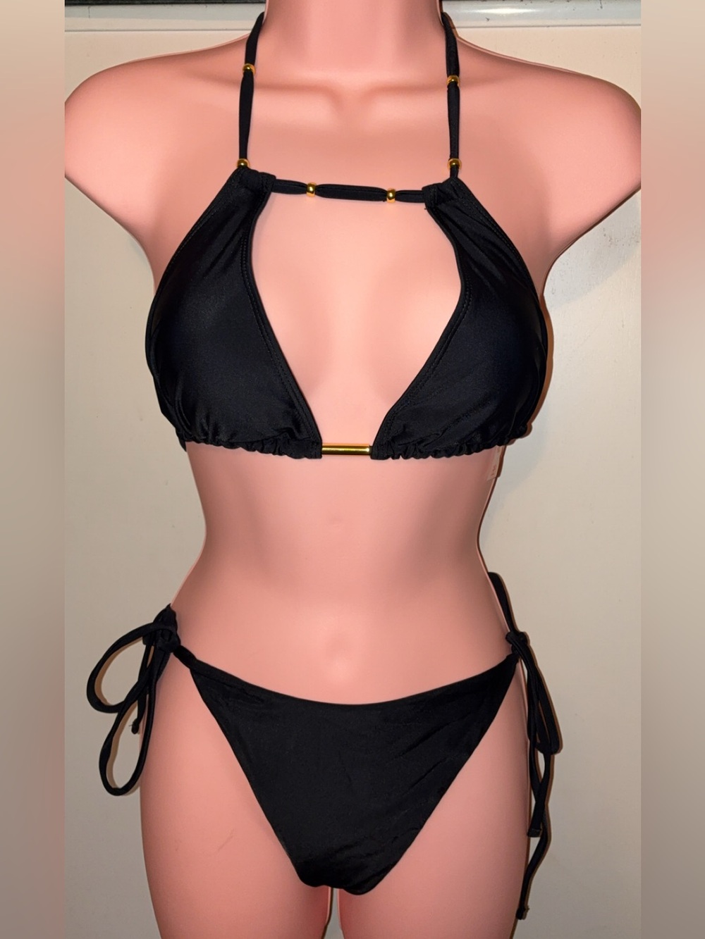 Sleek Black Tie-Side Bikini Set with Gold Accents
